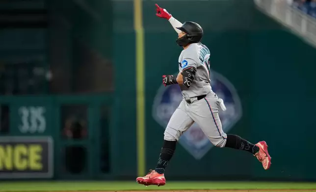 Miami Marlins' Heriberto Hernández celebrates after his home run against the Washington Nationals as he runs the bases during the sixth inning of a baseball game, Monday, June 1, 2026, in Washington. (AP Photo/Jess Rapfogel)
