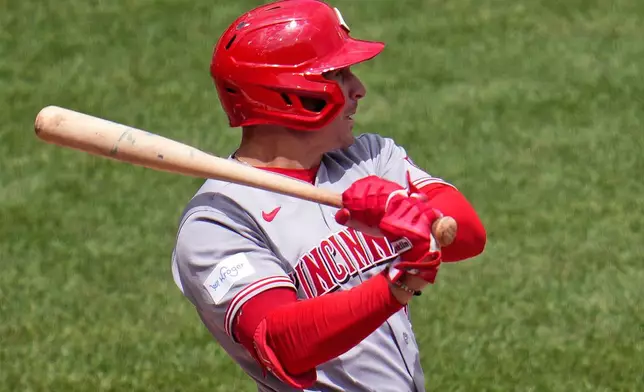 Cincinnati Reds' JJ Bleday singles off Pittsburgh Pirates pitcher Mitch Keller, driving in two runs, during the fourth inning of a baseball game in Pittsburgh, Sunday, June 28, 2026. (AP Photo/Gene J. Puskar)