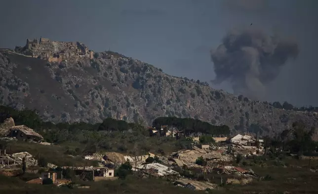 Smoke rises to the sky in an area near Beaufort Castle following an Israeli military strike in southern Lebanon as seen from northern Israel, Friday, June 19, 2026. (AP Photo/Leo Correa)
