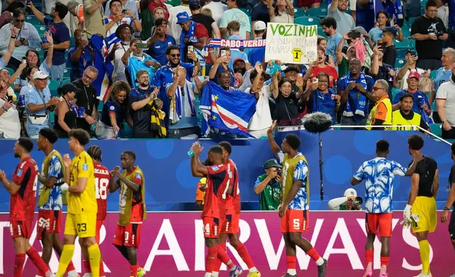 Cape Verde supporters react following the World Cup Group H soccer match between Uruguay and Cape Verde in Miami Gardens, Fla., Sunday, June 21, 2026. (AP Photo/Rebecca Blackwell)