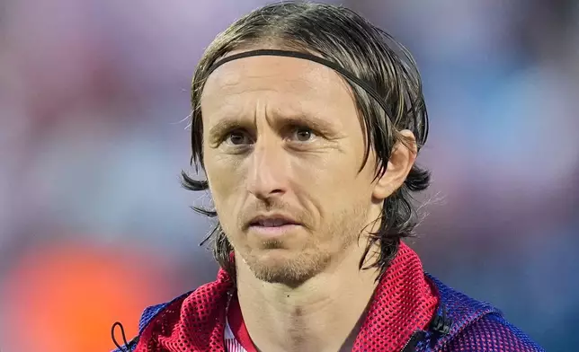 FILE - Croatia's Luka Modric lines up before the international friendly soccer match between Croatia and Slovenia in Varazdin, Croatia, June 7, 2026, (AP Photo/Darko Bandic, File)