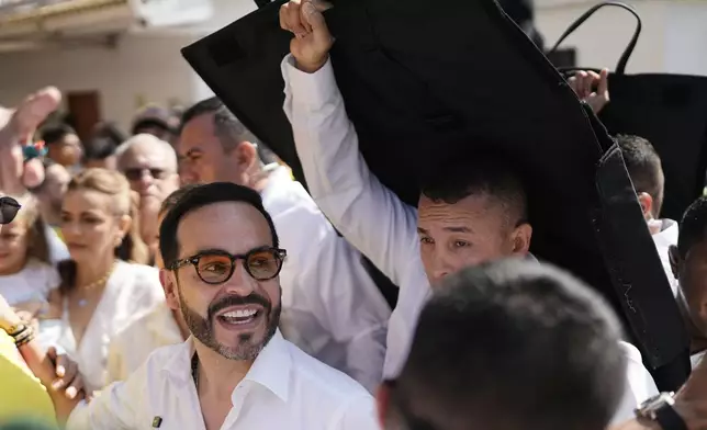 Presidential candidate Abelardo de la Espriella of the Defenders of the Motherland movement depart a polling station after voting during the presidential election in Barranquilla, Colombia, Sunday, May 31, 2026. (AP Photo/Ivan Valencia)