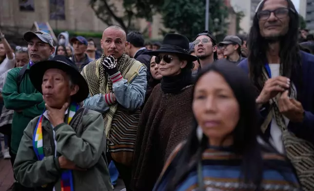 Supporters of presidential candidate Ivan Cepeda of the ruling Historic Pact coalition react as presidential election results are announced in Bogota, Colombia, Sunday, May 31, 2026. (AP Photo/Matias Delacroix)
