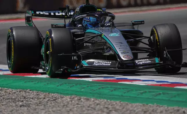 Britain's George Russell steers his Mercedes during the first free practice for the Spain F1 Grand Prix at the Barcelona Catalunya racetrack in Montmelo, near Barcelona, Spain, Friday, June 12, 2026. (AP Photo/Fatima Shbair)