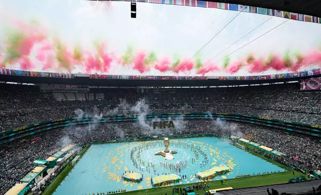 Performers on the pitch during the opening ceremony before the start of the World Cup Group A soccer match between Mexico and South Africa in Mexico City, Thursday, June 11, 2026. (AP Photo/Ricardo Mazalan)