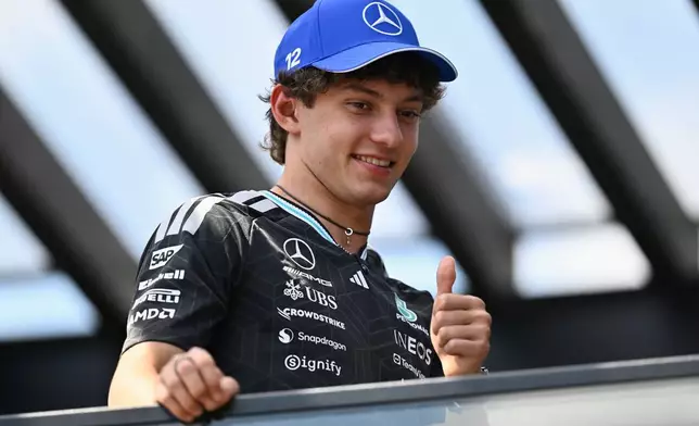 Mercedes driver Andrea Kimi Antonelli of Italy looks from a balcony at the paddock ahead of the Austrian F1 Grand Prix, in Spielberg, Austria, Thursday, June 25, 2026. (AP Photo/Denes Erdos)