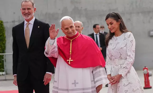 Pope Leo XIV is welcomed by Spain's King Felipe VI and Queen Letizia upon his arrival at Adolfo Suarez Madrid-Barajas International Airport in Madrid, Saturday, June 6, 2026, marking the start of his seven-day apostolic journey to mainland Spain and the Canary Islands. (AP Photo/Alessandra Tarantino)
