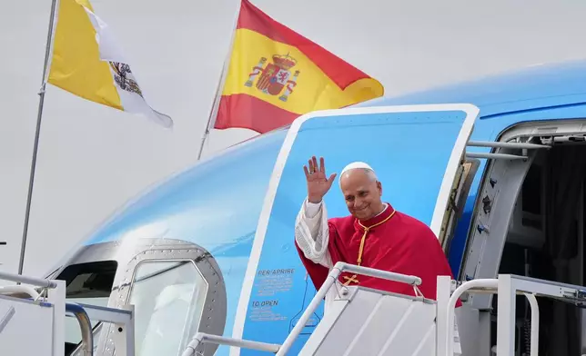 Pope Leo XIV arrives at Madrid's Adolfo Suarez International Airport, Saturday, June 6, 2026, as he starts a seven-day apostolic journey to mainland Spain and the Canary Islands. (AP Photo/Alessandra Tarantino)