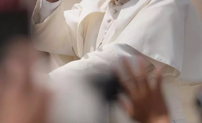 Pope Leo XIV waves as he leaves after his weekly general audience in St. Peter's Square at The Vatican, Wednesday, June 3, 2026. (AP Photo/Andrew Medichini)