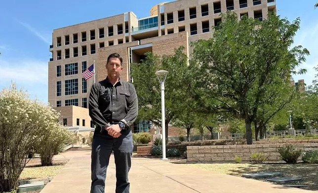 DEA Special Agent David Howell, who filed a whistleblower complaint, stands outside the U.S. district courthouse in Albuquerque, N.M., on Friday, June 12, 2026. (AP Photo/Susan Montoya Bryan)