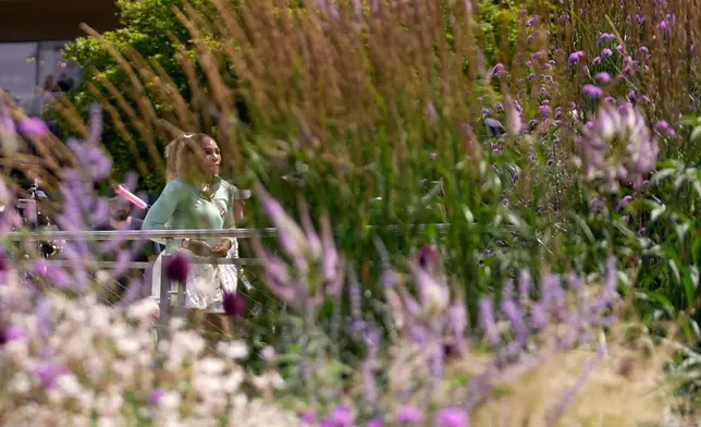 Serena Williams of the United States arrives for a practice session ahead of her women's singles match against Maya Joint of Australia at the Wimbledon Tennis Championships in London, Tuesday, June 30, 2026.(AP Photo/Brian Inganga)