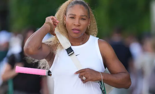 Serena Williams of the United States arrives to practice one day ahead of the start of the Wimbledon Tennis Championships in London, Sunday, June 28, 2026. (AP Photo/Kin Cheung)