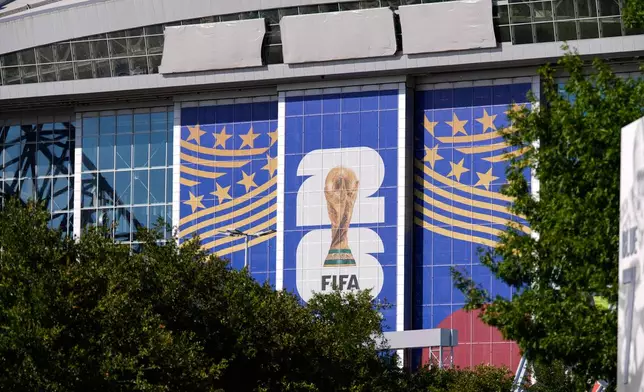 AT&amp;T Stadium, where upcoming World Cup soccer matches are scheduled to be played, has its name covered by three gray tarps Monday, June 1, 2026, in Arlington, Texas. (AP Photo/Tony Gutierrez)