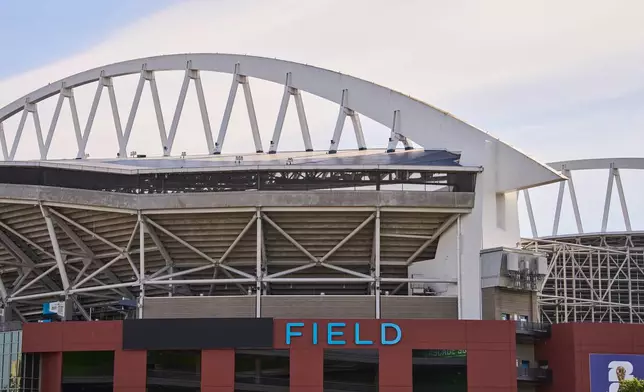 A partial covering is seen over Lumen branding at Lumen Field, which will be named Seattle Stadium during the 2026 FIFA World Cup, Wednesday, May 20, 2026, in Seattle. (AP Photo/Lindsey Wasson)