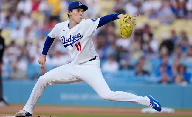 Los Angeles Dodgers starting pitcher Roki Sasaki throws to the plate during the first inning of a baseball game against the Los Angeles Angels, Friday, June 5, 2026, in Los Angeles. (AP Photo/Mark J. Terrill)