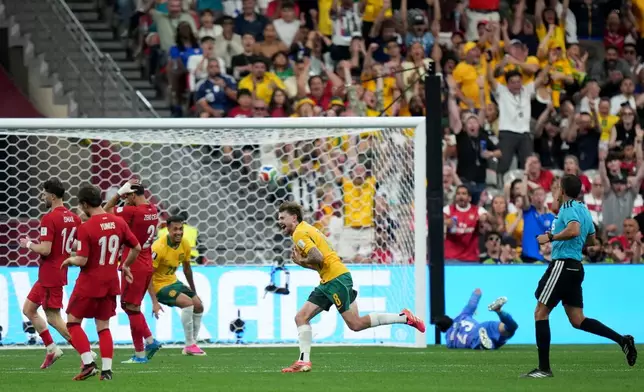 Australia's Conor Metcalfe celebrates scoring a goal, during the World Cup Group D soccer match between Australia and Turkey in Vancouver, Canada, Saturday, June 13, 2026. (Darryl Dyck/The Canadian Press via AP)