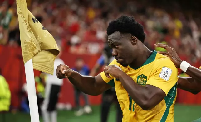 Australia's Nestory Irankunda (17) celebrates scoring the first goal against Turkey during the World Cup Group D soccer match, in Vancouver, British Columbia, Saturday, June 13, 2026. (AP Photo/Kaleb Tatum)