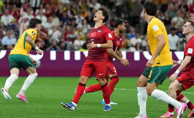 Turkey's Arda Guler (8) reacts after missing a shot during the World Cup Group D soccer match between Australia and Turkey in Vancouver, British Columbia, Saturday, June 13, 2026. (AP Photo/Abbie Parr)