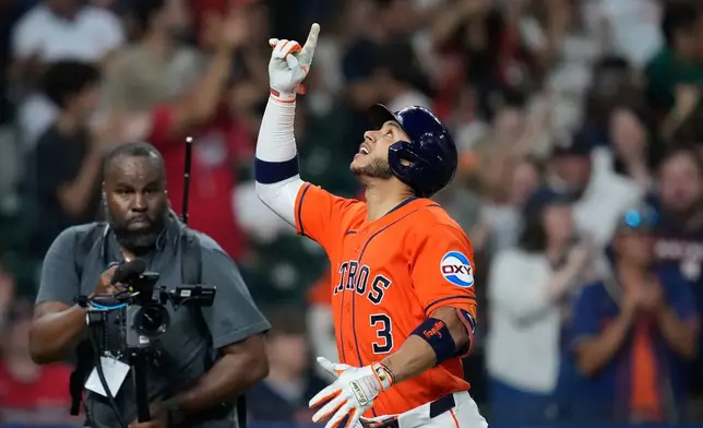 Houston Astros' Jeremy Peña (3) celebrates after hitting a solo home run during the seventh inning of a baseball game against the Cleveland Guardians, Friday, June 19, 2026, in Houston. (AP Photo/Kevin M. Cox)