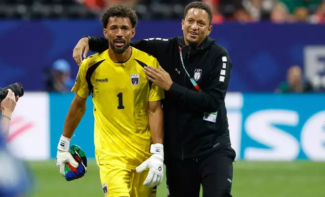 Cabo Verde goalkeeper Vozinha, left, reacts after the World Cup Group H soccer match between Spain and Cape Verde in Atlanta, Monday, June 15, 2026. (AP Photo/Erik S. Lesser)