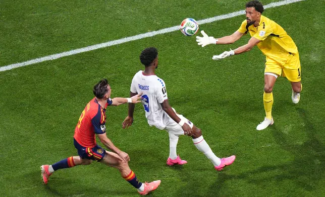 Cape Verde goalkeeper Vozinha (1) makes a save during the World Cup Group H soccer match between Spain and Cape Verde in Atlanta, Monday, June 15, 2026. (AP Photo/Jacob Kupferman)