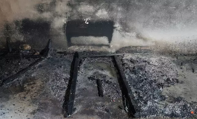 A remnants of a charred bed is seen following a fire at a nursing home in Anguruwatota, Sri Lanka, Friday, June 5, 2026.(AP Photo/Eranga Jayawardena)