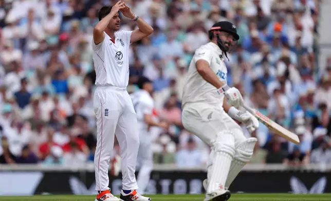 England's Josh Tongue reacts to a missed chance on day four of the Second Rothesay Test cricket match between England and New Zealand in London, England, Saturday, June 20, 2026. (Ben Whitley/PA via AP)
