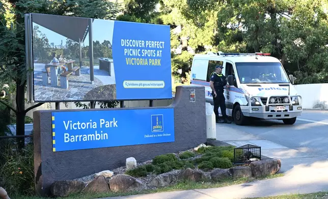 Police at the entry to Victoria Park as preparatory earthworks get underway for the 2032 Olympic Stadium in Brisbane, Australia, Monday, June 1, 2026. (Darren England/AAP Image via AP)