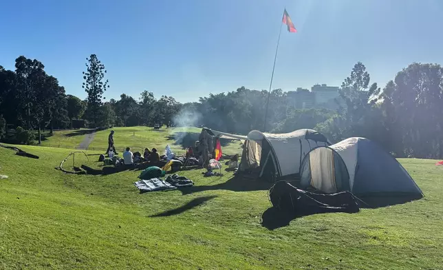 Protesters camp just outside the security fencing for the 2032 Olympic Stadium site at Brisbane's Victoria Park, Australia, Monday, June 1, 2026. (AP Photo/John Pye)