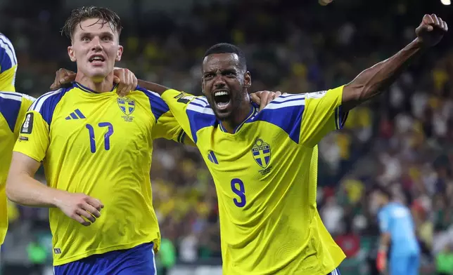 Sweden's Alexander Isak (9) celebrates with Sweden's Viktor Gyokeres (17) after he scored to put Sweden up, 3-1, during the World Cup Group F soccer match between Sweden and Tunisia in Guadalupe, near Monterrey, Mexico, Sunday, June 14, 2026. (AP Photo/Sofia Yaker)