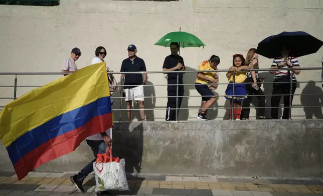 Voters line up at a polling station during the runoff election in Barranquilla, Colombia, Sunday, June 21, 2026. (AP Photo/Ivan Valencia)