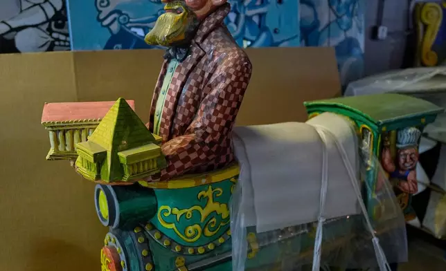 A figure of Eugene Lewis from the Fox Trot Carousel is seen in a state government storage facility Wednesday, June 24, 2026, in Nashville, Tenn. (AP Photo/George Walker IV)