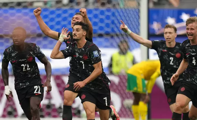 Canada's Stephen Eustaquio (7) celebrates scoring their opening goal against South Africa during the World Cup round of 32 soccer match in Inglewood, Calif., near Los Angeles, Sunday, June 28, 2026. (AP Photo/Andre Penner)
