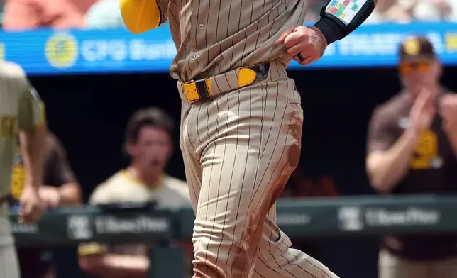 San Diego Padres' Rodolfo Duran scores during the second inning of a baseball game against the Baltimore Orioles, Sunday, June 14, 2026, in Baltimore. (AP Photo/Daniel Kucin Jr.)
