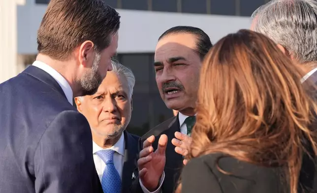 FILE - Vice President JD Vance, left, talks to Pakistan's Chief of Defence Forces and Chief of Army Staff Field Marshall Asim Munir, right, and Pakistani Deputy Prime Minister and Foreign Minister Mohammad Ishaq Dar, center, before boarding Air Force Two after attending talks on Iran in Islamabad, Pakistan, April 12, 2026. (AP Photo/Jacquelyn Martin, Pool, File)