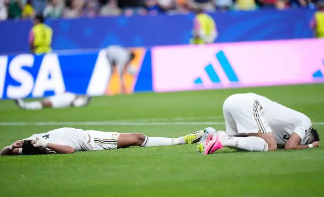 Saudi Arabia players react after the World Cup Group H soccer match between Cape Verde and Saudi Arabia in Houston, Friday, June 26, 2026. (AP Photo/Ashley Landis)
