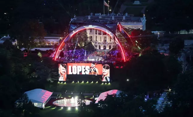 Diego Lopes is introduced during UFC Freedom 250 on the South Lawn of the White House from the top of the Washington Monument on Sunday, June 14, 2026, in Washington. (Win McNamee/Pool Photo via AP)