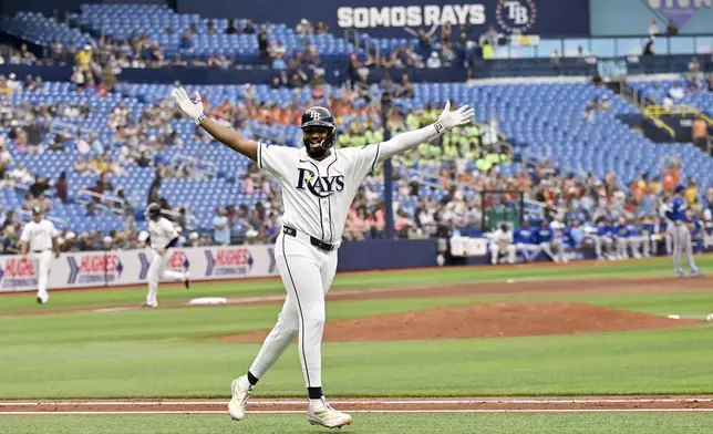 Tampa Bay Rays' Junior Caminero celebrates his three-run home run during the eighth inning of a baseball game against the Kansas City Royals Thursday, June 25, 2026, in St. Petersburg, Fla. (AP Photo/Jason Behnken)