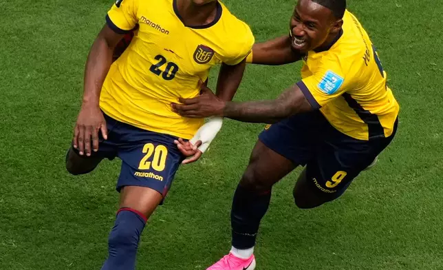 Ecuador's Nilson Angulo (20) celebrates his goal with John Yeboah (9)during the World Cup Group E soccer match against Germany in East Rutherford, N.J., near New York, Thursday, June 25, 2026. (AP Photo/Seth Wenig)