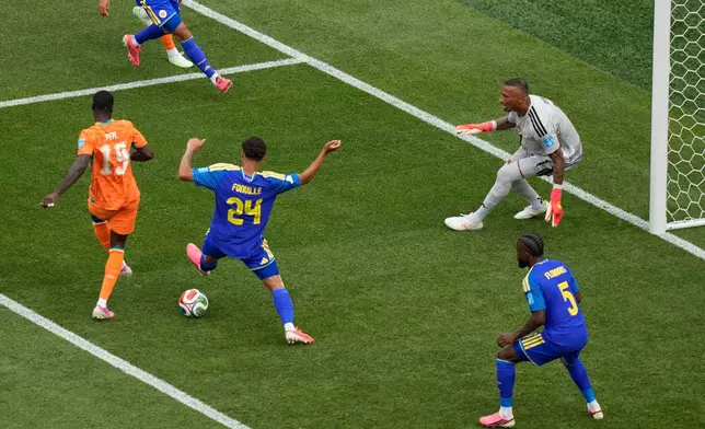 Ivory Coast's Nicolas Pepe (19) scores his side's opening goal during the World Cup Group E soccer match between Curacao and Ivory Coast in Philadelphia, Thursday, June 25, 2026. (AP Photo/Matt Slocum)
