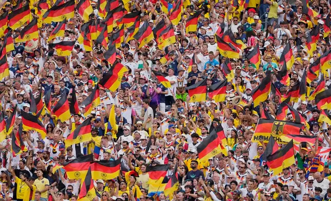 Fans of Germany cheer during the World Cup Group E soccer match between Germany and Ecuador in East Rutherford, N.J., near New York, Thursday, June 25, 2026. (AP Photo/Yuki Iwamura)