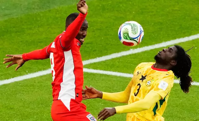 Panama's Cecilio Waterman, left, and Ghana's Caleb Yirenkyi (3) vie for the ball during the World Cup Group L soccer match between Ghana and Panama in Toronto, Wednesday, June 17, 2026. (Chris Young/The Canadian Press via AP)