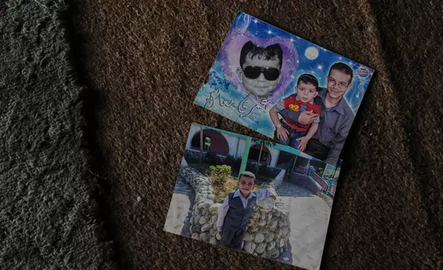 Photos of the father and brother of Razan Sharif Hamdi Shanan, 10, the sole survivor of an Israeli airstrike that killed her parents and siblings, are displayed at the home where she is staying with relatives in Gaza City, Monday, Jan. 19, 2026. (AP Photo/Jehad Alshrafi)