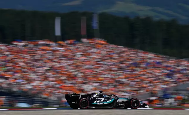 Mercedes driver George Russell of Britain steers his car during the qualifying session ahead of the Austrian F1 Grand Prix, in Spielberg, Austria, Saturday, June 27, 2026. (AP Photo/Denes Erdos)