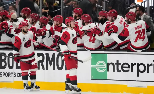 Carolina Hurricanes right wing Jackson Blake (53) celebrates his goal with teammates during the second period in Game 6 of the NHL hockey Stanley Cup Final series against the Vegas Golden Knights, Sunday, June 14, 2026, in Las Vegas. (AP Photo/John Locher)