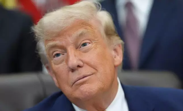 President Donald Trump is pictured in the Oval Office of the White House during an executive order signing about quantum computing, Monday, June 22, 2026, in Washington. (AP Photo/Jacquelyn Martin)