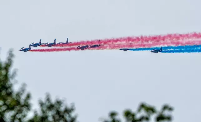 France's military aerobatic team, the Patrouille de France, flys over Washington in a tribute to America's 250th birthday, Monday, June 22, 2026. (AP Photo/J. Scott Applewhite)