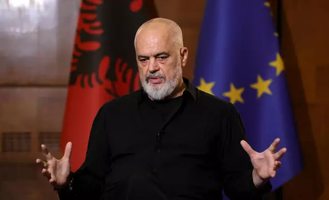 Albanian Prime Minister Edi Rama speaks during an interview with The Associated Press in Tirana, Albania, Tuesday, June 9, 2026. (AP Photo/Hameraldi Agolli)