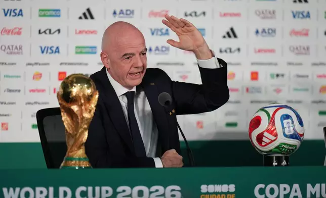 FIFA President Gianni Infantino speaks during a news conference at the stadium in Mexico City, Wednesday, June 10, 2026, a day before the opening FIFA World Cup match between Mexico and South Africa. (AP Photo/Eduardo Verdugo)