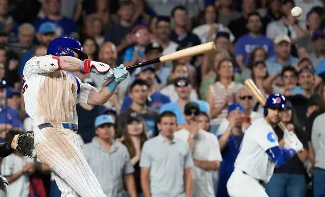 Chicago Cubs' Pete Crow-Armstrong hits the game-winning one-run single during the ninth inning of a baseball game against the Athletics in Chicago, Thursday, June 4, 2026. (AP Photo/Nam Y. Huh)
